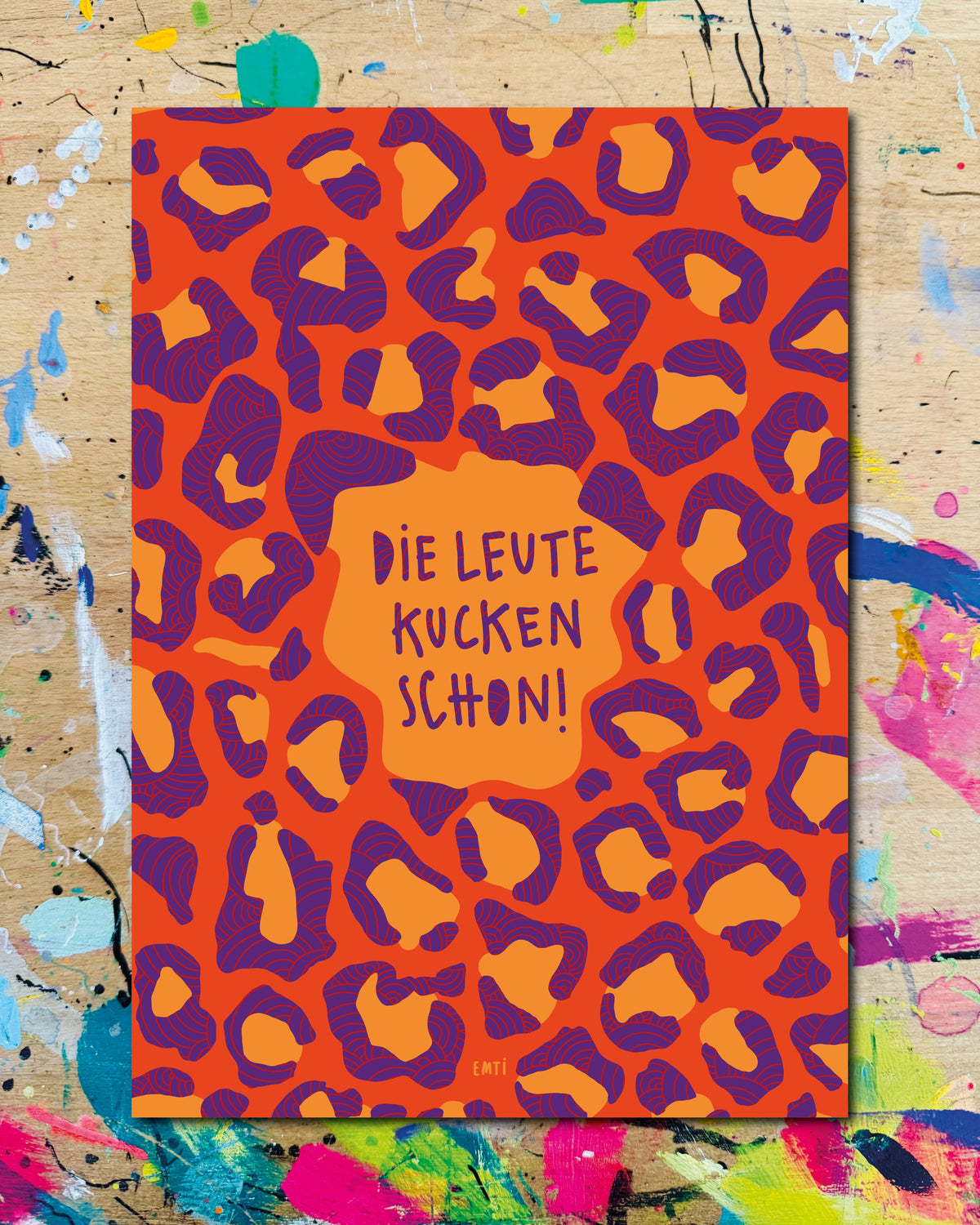 Postkarte: oranges Leopardenmuster mit dem Schriftzug „Die Leute kucken schon!“