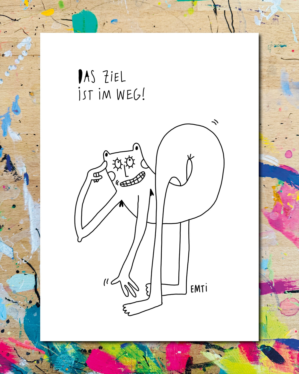 Postkarte: eine lange Figur mit Sternaugen, in sich verknotet, dazu der Schriftzug „Das Ziel ist im Weg!“