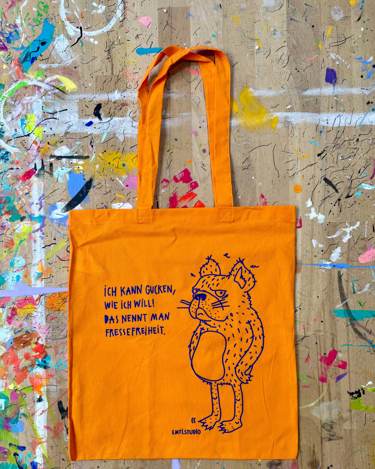 Der ganze Beutel in Orange mit Henkeln, flach liegend